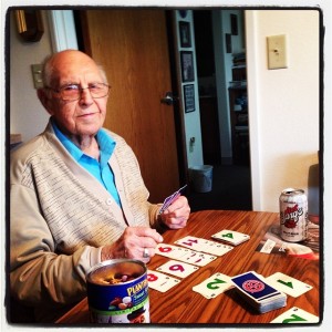 Dad, winning at cards, as usual, at his apartment.
